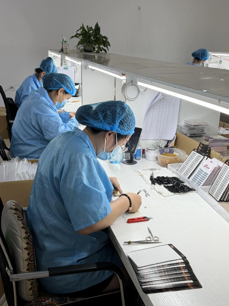 Client manufacturing team working on lash products
